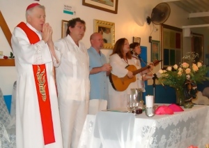 Rev. Nettie plays music for Padre Ron Roth & John of God in Brazil in 2004